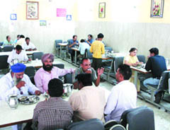 Residents relish lunch at Vijay Dhaba in Jalandhar.