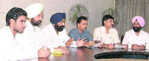 Members of Punjab Sports Association for Blind address a press conference in Ludhiana. 