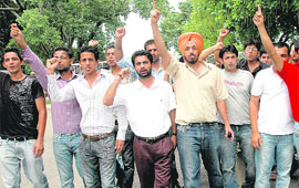 Students of various organisations protest in front of the VCs office at PU campus on Wednesday. 
