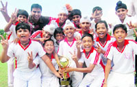 Members of APJ Academy celebrate their victory over Sunny Enclave at PCA stadium in Mohali on Thursday.