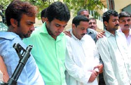 Four men held by the Delhi police for allegedly planning to kidnap a businessman in New Delhi on Thursday. 