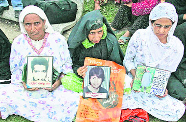 Women who say they are the mothers of missing Kashmiri youths attend a demonstration organised by the Association of Parents of Disappeared Persons in Srinagar on Thursday.
