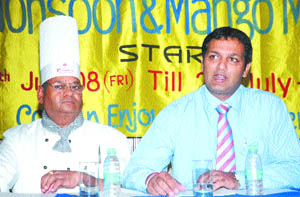 Amit Vij, manager, Hotel President, addresses a press conference in Jalandhar on Thursday.
