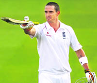 Englands Kevin Pietersen celebrates after completing his century against South Africa during the first day of the Test at Lords in London. 