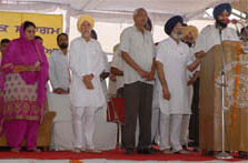 Minister for information and public relations Bikram Singh Majithia administering oath to the recently elected panchayat members at the grain market, Bathinda, on Friday.