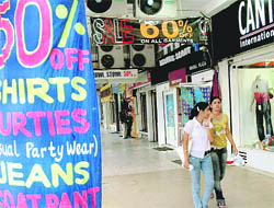 Sales beckon customers who are turning elusive in this era of rising prices.