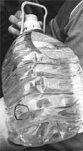 A sealed bottle of Bisleri containing a mosquito, in Patiala. 