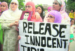 Kashmiri women protest against the Delhi Police for allegedly arresting Tariq Batloo in Srinagar on Saturday.