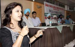 Manisha Verma, AUPP student in Australia, interacting with participants at a seminar on Australian education in Bathinda on Sunday.