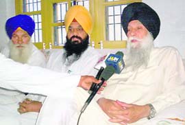 Capt Kanwaljit Singh talks to mediapersons at Jatana Ucha village, near Khamano, on Sunday. Samrala MLA Jagjiwan Singh Khirnian is also seen in the picture