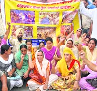 Unemployed BEd teachers hold a protest in Amritsar on Sunday.
