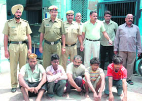 A police team with thieves in Ambala City on Monday. 