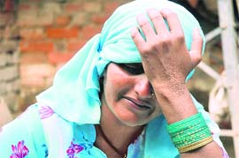 Punams mother Soraj mourns the death of her daughter in Sangoi village in Karnal on Monday