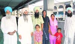 BJP panches, along with their families, who have taken shelter in Amritsar after alleged threats by an Akali MLA.