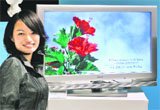 A Sony employee displays the world's highest energy efficient 32-inch LCD television set "Bravia JE1" which achieves annual power consumption to 86kW per year at the company's showroom in Tokyo