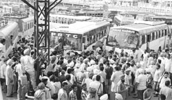 Members of PRTC Workers Union block the main gate of bus stand after a clash in Patiala