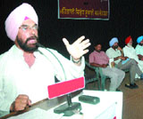 CPI (ML) state secretary DS Khatkar addresses a convention in Jalandhar.