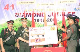 Lt-Gen Z.U. Shah, deputy chief of the Army Staff, Colonel Commandant, releasing the special cover to commemorate an event in honour of 60 years of glorious and dedicated services of the 41 Field Artillery Regiment in Satwari at Jammu.