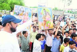 Protesters demonstrating at Satwari Chowk during the Jammu bandh on Wednesday.