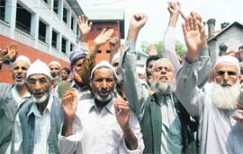 Muslim Hajis protesting for the acceptance of their demands in Srinagar on Wednesday.