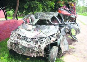 This is what remained of a car and a canter after they collided near Fatehabad