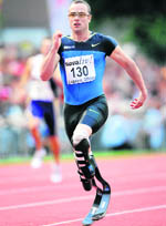 South African Oscar Pistorius runs with his carbon fibre blades during his 400 metres series at the Athletics Meeting on Wednesday in Lucerne. 