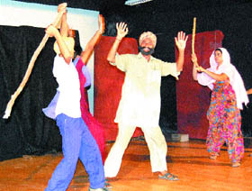 A scene from play Nashe ki Maari Aurat Bechari staged at Virsa Vihar in Amritsar.