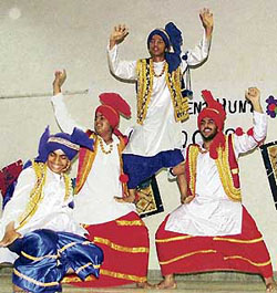 IN HIGH SPIRIT: Students of BCM Arya Model School perform bhangra during a talent contest in Ludhiana on Friday.