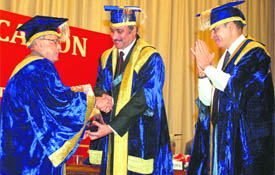 Union minister for external affairs Pranab Mukherjee being welcomed by union minister of health & family welfare Dr Anbumani Ramadoss and PGI director Dr K.K. Talwar at the 29th convocation of the PGI, in Chandigarh on Friday.