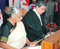 Chief Justice of the Himachal Pradesh High Court administers oath to Prabha Rau as the Governor of the state at the Raj Bhawan in Shimla on Saturday.