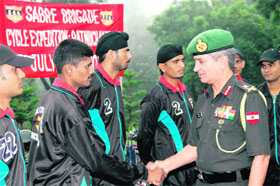 Lieut-Gen Vinay Sharma, GOC, Rising Star Corps, welcomes members of the cycling expedition at Yol Cantonment on Saturday.