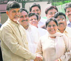 TDP president Chandrababu Naidu with BSP supremo Mayawati after a meeting at her residence in New Delhi on Saturday.