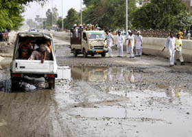 The Bathinda-Goniana road where potholes continue to trouble motorists.