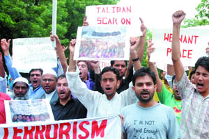 Activists of the Imami Students of India shout anti-Pakistan slogans during a protest against terrorism at Jantar Mantar in New Delhi on Sunday. 