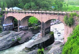 The century-old Matoor bridge over the Manooni Khud which has outlived its life. 
