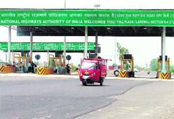 The newly constructed toll barrier at the Sutlej bridge.
