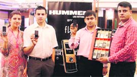 New mobile handsets being launched at a dealers meet in Ludhiana on Sunday.