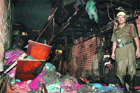 A shop in the Chandni Chowk market which caught fire in New Delhi