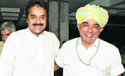 HJC chief and suspended MP Kuldeep Bishnoi and BJP MP Manvendra Singh leave after the NDA dinner-meeting in New Delhi