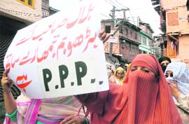 Peoples Political Party women supporters and Kashmiri labourers protesting against non-Kashmiri Bihari labourers in Srinagar on Monday.