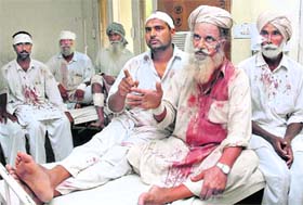 Some of the injured of a clash among Akali workers at Kotli Sabo village talk to mediapersons at the Bathinda civil hospital