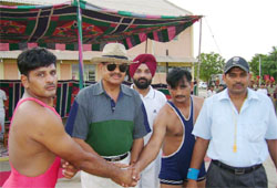 V.K. Sharma, DIG, BSF, Abohar sector, meeting wrestlers