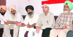 Representatives of different NGOs address a press conference on Budda Nullah in Ludhiana