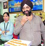Daljit Singh Kohli, brother of Prime Minister Manmohan Singh, in a jubiliant mood in Amritsar