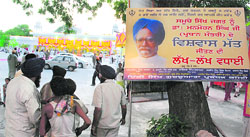 A poster congratulating Prime Minister Manmohan Singh on the UPA governments victory in the trust vote in Parliament displayed outside Gurdwara Rakab Ganj in New Delhi