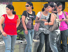 Visibly anxious MCM students after the incident of hooligansism outside their college on Thursday.