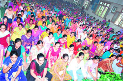 Students of A.S. College for Girls, Khanna, take part in a havan organised on the first day of the new session of the college.
