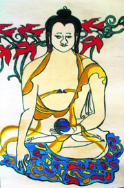 J.P. Singh paints his Buddha on a wooden plank