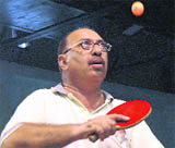 A player in action during the North Zone IA and AD Table Tennis Tournament being played at Table Tennis Hall, Sector 23, in Chandigarh.