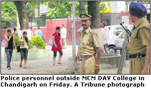 Police personnel outside MCM DAV College in Chandigarh on Friday.